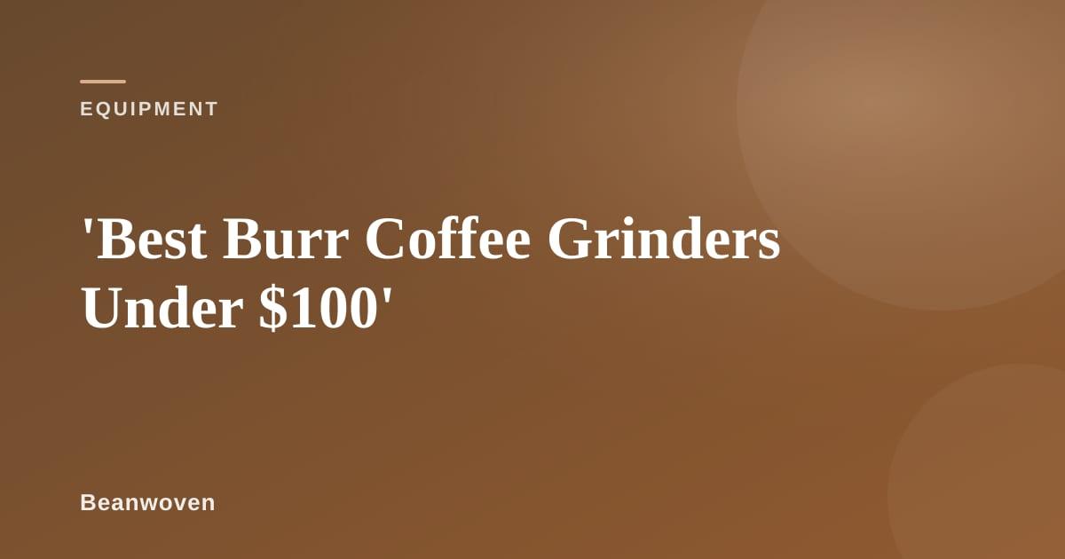 A burr coffee grinder on a wooden countertop with freshly ground coffee beans